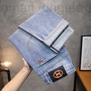 Men's Jeans designer Spring/Summer Korean Edition Small Foot Elastic Slim Fit European Brand Light Blue Pants H Home 7VES