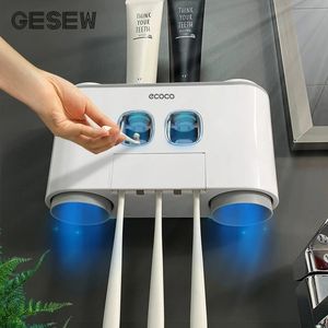 Toothbrush Holders GESEW Magnetic Holder Bathroom Automatic Toothpaste Dispenser Wall Paste squeezer Accessories Set 230710
