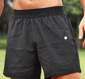 Lulus Pantaloncini sportivi da uomo Yoga Outdoor Fitness Quick Dry Lululemens Tinta unita Casual Pantaloni da corsa quarti sottili Design traspirante877ess