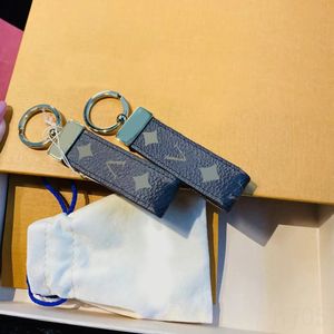 Универсальный дизайнерский ключ -чат Dragonne Luxury Keyring кошелек кошелек мужчина персонализированные модные аксессуары Portachiavi Женщины ключи от сети автомобилей Cool PJ047 E23