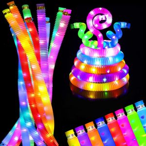 Nyhetsspel 12Pack LED Light Up Pop Tubes Sensoriska leksaker Glow Sticks Finmotorik Lärleksaker Festfavoriter Dekorationer Dra Stretch Toy 230710