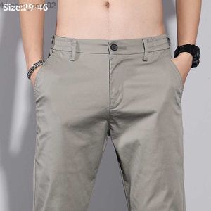 Calças masculinas de ajuste ultrafino calças lápis de negócios masculinas de algodão stretch trabalho casual jovem escritório tamanho grande 42 46 roupas cáqui Z230712