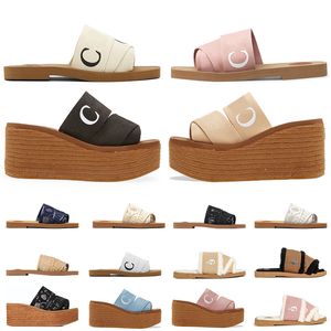 2023 Chinelos designer de moda feminina Sandálias Woody Paris Sandália Flat Mules Chinelo Vela Malha preta bordada lona borracha slider feminino sapatos de praia deslizantes