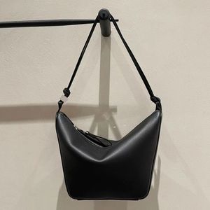 Hammock dumpling bag top layer cowhide vegetable basket girl bag leather bucket bag large-capacity bag commuting lychee pattern hand-held temperament bag