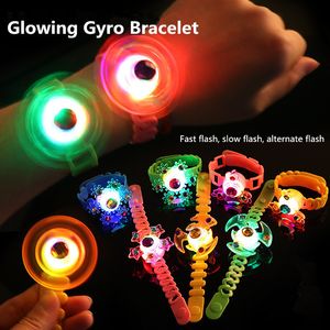 Led Rave Toy 12PCS/PACK Luminous Wrist Band Manual Rotating Soft Flashing Gyro Bracelet for Kids LED Cartoon Lights Luminous gyro bracelet 230710