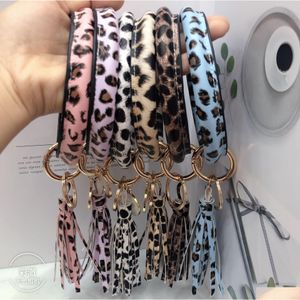 Ключевые кольца Pu Leopard Print Bracelet Keyring Cactus Sunflower Print Ceending Bangles с кисточкой для брелок 25 Дизайн модные украшения Dhwuq