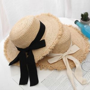 Cappelli a tesa larga cappello estivo con fiocco in nastro bianco nero cappello da donna fatto a mano in paglia di rafia piatta femminile berretto da spiaggia per vacanze all'aperto Panama Sun UV