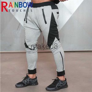 Herrbyxor Rainbowtouches Byxa 2022 Nytt gym Sportträning Herrbyxor Smal Splicing Bomull Casual Fitness Sportbyxor Överlägsen kvalitet J230712