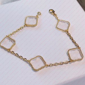 Clássico lindo bracelete de quatro folhas. Acabamento dourado + transparente. Pulseira de designer de personalidade. Presente de noiva de casamento de dia dos namorados de Natal. Joias de designer de moda.