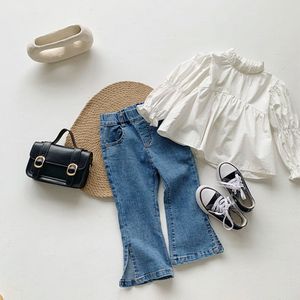 Jeans Primavera Neonate Denim Flare Pants Tinta unita Toddlers Bambini Pantaloni elastici per bambini in stile coreano 230711