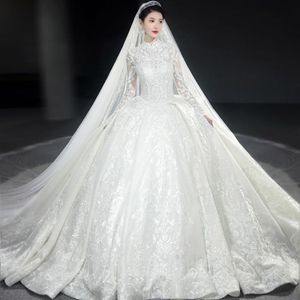 2023 Plus Size una linea Abiti da sposa Maniche lunghe Illusion Applique in pizzo Gioiello Collo trasparente Perle con perline Cappella su misura Weddin2694