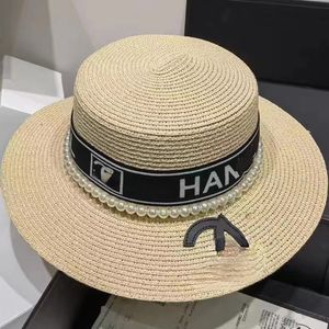 夏のビーチの日焼け止め帽子ビーチサンリス女性の黒い白いデザイナーキャップ