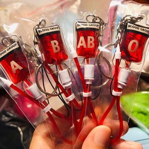 Keychains Creative A B O Ab Sick Plasma Pack Key Chain Car Bag Pendant Decoration Cool Birthday Party Gift Jewelry For Couples