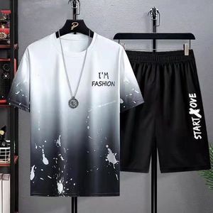 メンズトラックスーツメンズスーツ半袖Tシャツショート2PCSスーツカジュアルスポーツウェアサマービーチスーツメンズルーズファッショントラックアンドフィールド服230713