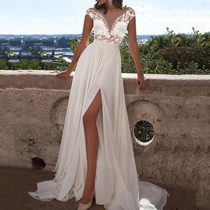 Abiti casual Abito di pizzo bianco Estate Sexy scollo a V profondo Backless Spacco alto Abiti da sposa Abiti da damigella d'onore lunghi Abiti spaccati