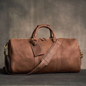 ダッフェルバッグGeunine Leather Vintage Men's Hand Luggage Bag Travel Bag Gragapacive Single Shourdeld Messenger Boston Bostonバッグ17インチラップトップ230714