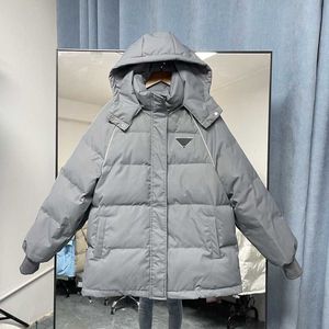 Autumn and winter ladies hooded loose white duck down short coat, loose bread clothing small autumn and winter coat, cuffs tightened to keep warm.