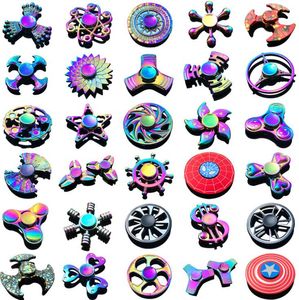 120 tipi In stock Spinner Fidget Spinner a mano arcobaleno TriFidget Metal Gyro Ali di drago Giocattoli con dita degli occhi Trottola Spinner con scatola