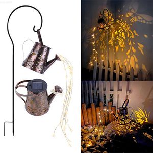 Dekoracje ogrodowe podlewanie może oświetlić żelazo puste sztuka lampa słoneczna na zewnątrz dekoracja ogrodu wisząca wodoodporna metalowa czajnik Lattern Light Light L230714
