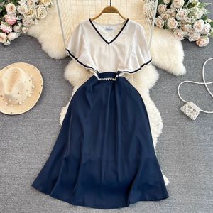 Korean version light cooked style retro temperament contrast color lotus leaf sleeve V-neck waist up slim mid length A-line large swing dress