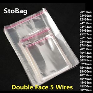 StoBag 100pcs Clear Self Adhesive Cello Cellophane Bag Self Sealing Plastic Bags Clothing Jewelry Packaging Candy OPP Resealable Y306g