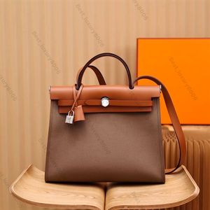 Designer Handbag Classic Togo Cowhide Fashion Women's Bag Canvas axelväska Hand Bill of Lading Solid Color