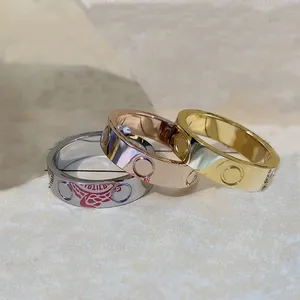 Alta qualidade 316L Banda de Aço Inoxidável Ouro 18K Luxo Anel de Amor Na moda Noivado Casamento Casal Unissex Anéis de Diamante Jóias de Designer para Presentes Femininos
