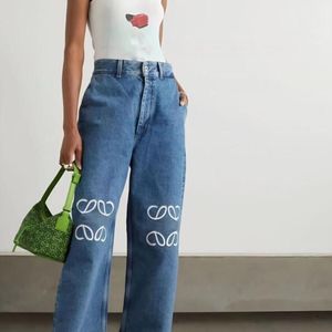 Designerin Frauen Jeans Ankunft High Wailstraße ausgehöhltes Patch Sticked Decoration Casual Luxus Blue Straight Denim Hosen