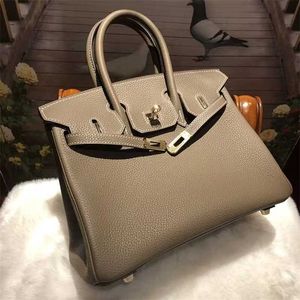 Luxurys Top Handbag Bag Platinum 2024 Fashion and Atmosphere Headloyer Cowhide Cartyplic the Clase Conder One Cantlique Straddle Women's Togo Hight