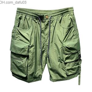 Herr shorts mini herrbyxor fast färg patch arbete kostym sommar full matchande koreansk väska mode casual byxor mäns kläder z230717