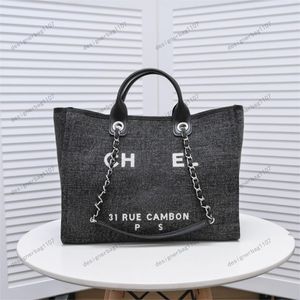 Borsa tote Primavera 2023 Nuovo ricamo Logo Tessuto Tela a righe Borsa per la spesa portatile Borsa da spiaggia Borsa a spalla con chignon Borsa a tracolla Portafogli a tracolla