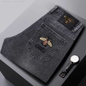 Горячие дизайнерские джинсы джинсы джинсы Slim Fit Feet Jeans Slim Fit European Pants Elastic Young Men Bants