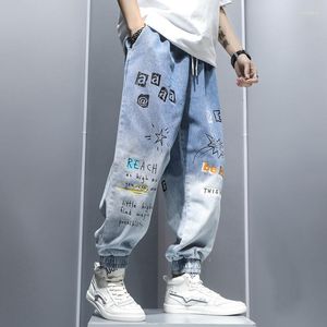 Mäns jeans graffiti tryck gradient hiphop byxor harem tecknad lös casual ankel bandade byxor last denim för män