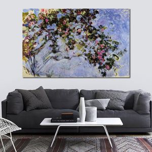 Dipinti ad olio dipinti a mano su tela di Claude Monet L'opera d'arte del paesaggio del giardino di Rose Bush per l'arredamento del ristorante