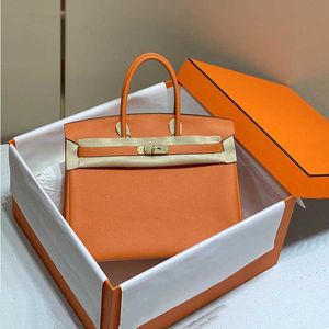 Bolsa de bolsa feita à mão Luxurys Top Leather Bolsa 2024 Linha de cera clássica Togo Calfskin Lychee feminina Lock Cy