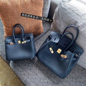 Handgjorda handväska Bag Luxurys toppläder handväska 2024 litchi mönster äkta kvinnors mode headrock kohud en axel handhållen cy
