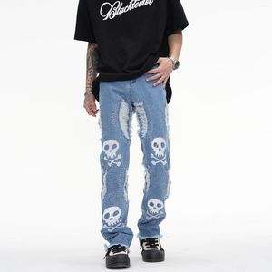 Jeans da uomo con teschi ricamati pantaloni da motociclista strappati dritti hip-hop strappati blu per uomo pantaloni casual in denim streetwear nero
