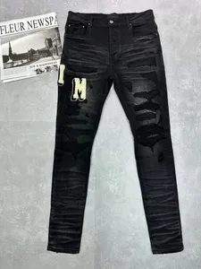 mode mens jeans designer mäns jean byxor rippade varumärkesdesign brev broderi motorcykel män mager hip hop street cowboy jeans 28-40