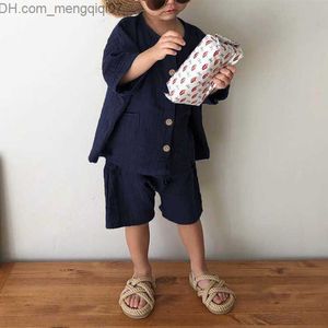 Conjuntos de roupas de algodão Conjunto de roupas infantis de verão Novas meninas e meninos Camisa de bolso de 2 peças + Shorts soltos Conjunto casual para bebês TZ72 Z230717