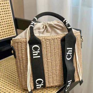 Övre handtag kvinnliga män Tote Woody Beach Bag Stråkorg Designer Raffias Vacation Travel Crossbody Luxury Weave Handväska Koppling Arbetsväska Stora handväskor