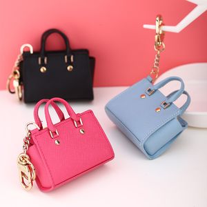 Chaveiros Colhedores Milesi Marca Couro Mini Bolsa Chaveiro Feminino Asas de Couro Moda AirPod Fone de Ouvido Presente Feminino 230718