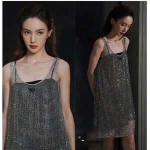 Summer ladies halter vest dress, loose two sets of sexy hollow skirt, simple and casual style, slim fashion, star with the same style.