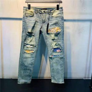Designer Luxurys Jeans da uomo Ricamo casual Pantaloni patchwork vintage Applique classica Fori moda Motociclista Slim-leg Was256U