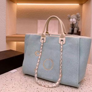 Летняя дизайнерская пляжная сумочка C буква на плече флэш -офис высококачественный классический пакет Canvas с кнопкой ретро женский пакетный пакет Lassic Anvas Bag 16
