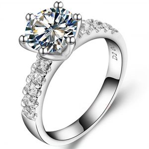 Utmärkt 2CT Brilliant Synthetic Diamond Wedding Ring för kvinnlig fast sterlingsilverring med vitt guldtäckning2958