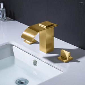 Раковина ванной комнаты с марионированным золотым краном водопада широко распространен