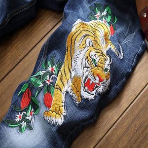 2020 popular New embroidered tiger flower jeans causal slim straight beggar pants Chinese style zipper flyer pattern trousers198v