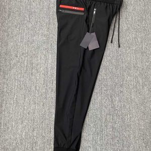 Spring and summer men's elastic lace-up trousers Haren pants, polyester fabric soft, comfortable and breathable, leisure sports, fashion.