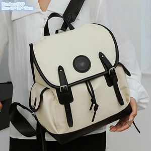 Fabrika toptan bayanlar omuz çantası flip hafif aşınmaya dayanıklı tuval öğrenci sırt çantası basit ve çok yönlü düz renk dikiş eğlence sırt çantaları 654#