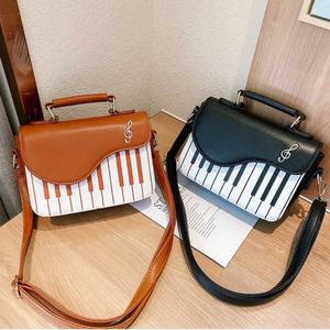 Koreansk piano design kvinnor axelväskor pu läder messenger väska handväska modekors kropp väska ficka myntväska paket